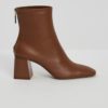 Демисезонные бежевые сапоги купить в аутлете Max Mara и Marina Rinaldi. 1
